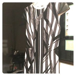 Cache dress with leather shoulders